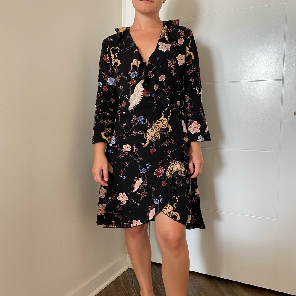 Wrap dress in beautiful bird/floral pattern